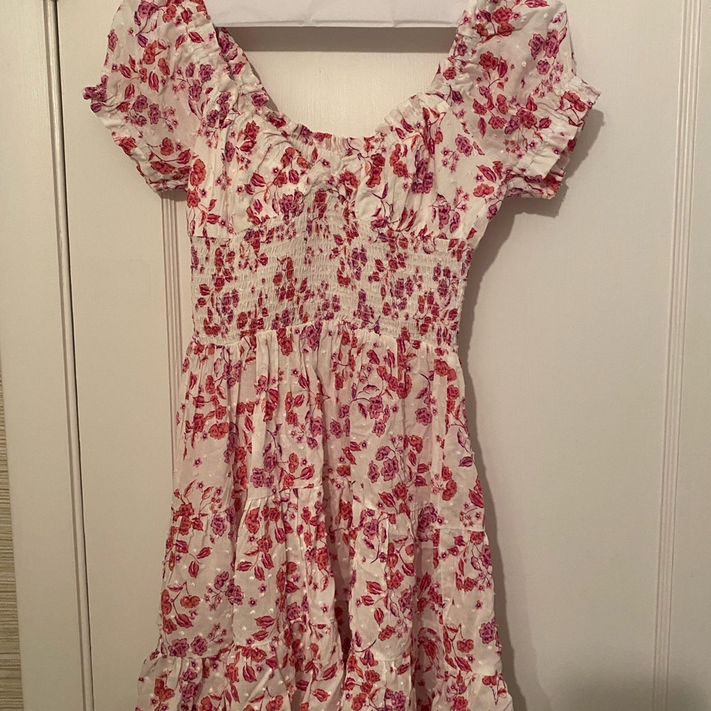 This pink and white dress from Isabelle’s Cabinet is a size S, great condition!